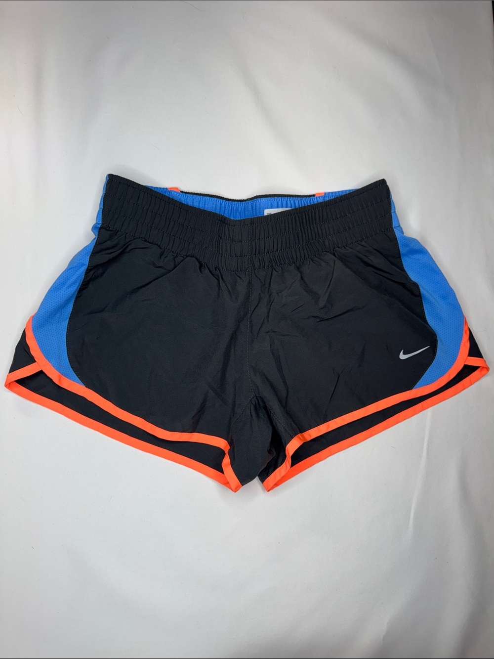 Nike Women's Black Shorts with Blue Panels and Orange Trim